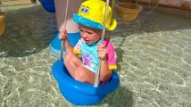 Funny Baby play on the outdoor playground and fun in the waterpark Nursery Rhumes Songs for children
