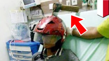 Helmet saves man’s life during random ax attack in Indonesia