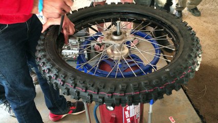 Johnny Campbell Shows ADVrally Riders How To Change A Motorcycle Tire