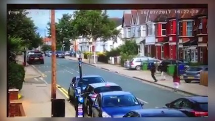 Watch: Car Mounts Pavement During Mass Brawl