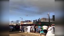 طائرات هليكوبتر تشارك فى إطفاء حريق السوق التجارى بإدفو فى أسوان