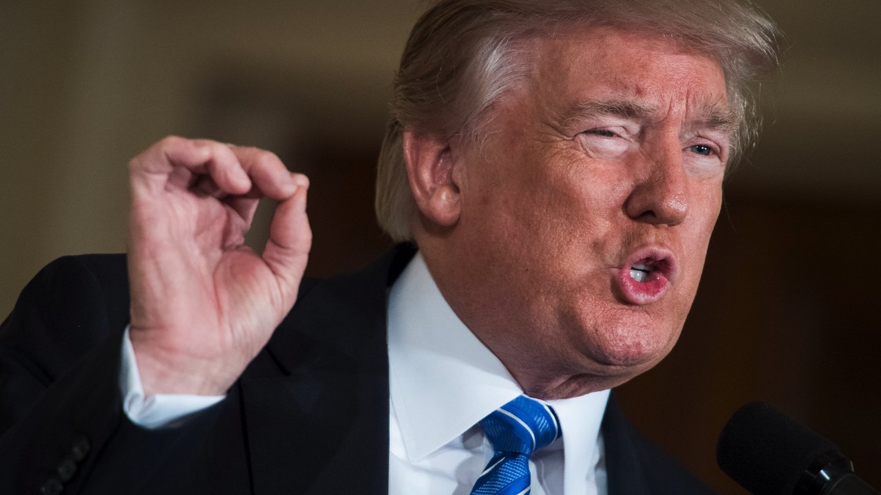 After six months as president, Trump still wants a border wall