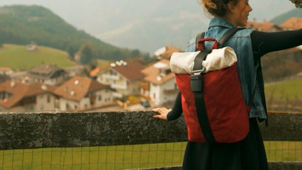 Look fresh with this backpack that is made out of old car materials