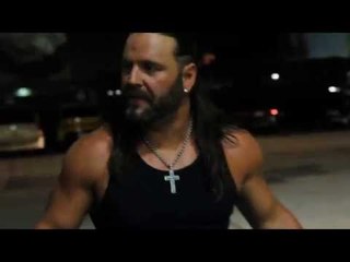 A Suspended James Storm is Escorted out of Impact Zone