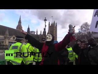 Scuffles & arrests as police shut down anti-Cameron protest
