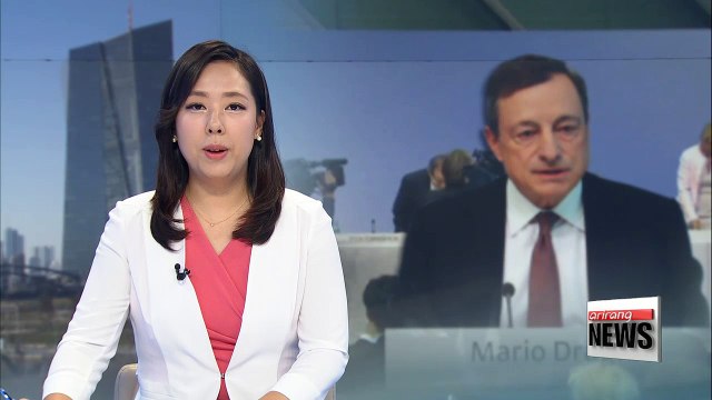 European Central Bank holds rates steady, but hints at possible stimulus easing in fall