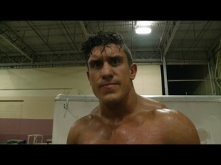 Here Comes Trouble... EC3 is not happy about having to face The KOTM Champion.