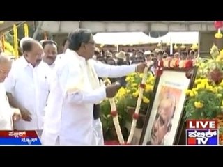 CM Marks Devaraj Urs Centenary by Paying Respects To his Statue In Front Of Vidhan Soudha