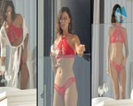 Lucy Mecklenburgh flashes her ample cleavage as she parades her VERY toned derrière in sultry bikini... after confirming