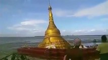 Rising river water levels causes Myanmar pagoda to collapse