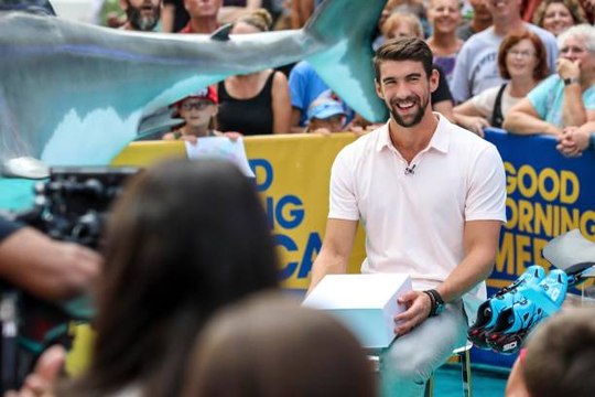 Great white lie: Michael Phelps 'races' shark