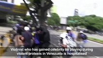 Venezuelan violinist hurt in anti-government protest