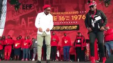 Julius Malema dancing on stage