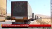 شاحنات نقل تصطف على امتداد 4 كيلو متر في معبر باب الهوى بانتظار السماح لها بالعبور إلى سوريا