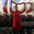 Football Fans distracting the air hostess during safety announcement [Funny]