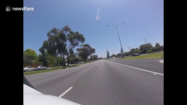 Motorbike sent onto opposite traffic lane after collision with car