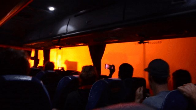 Bus Passes by Flames as Wildfire Scorches Biguglia on the French Island of Corsica