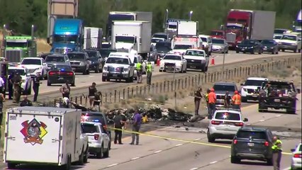 Four die when small plane crashes into highway