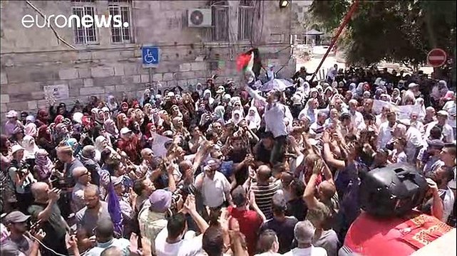 Muslim leaders in Jerusalem call for return to prayer at Al Aqsa mosque after Israel scales back security measures