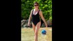 Bells Tiffani Amber Thiessen shows off in plunging swimsuit in Hawaii