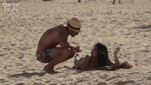 Htio je da kremom za sunčanje namaže zgodnu djevojku u bikiniju koja je sama ležala na plaži, ali kada se okrenula uslij