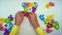 ABC puzzle Mixed learning the alphabet. Puzzle Surprise Eggs and Play Doh