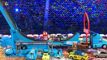 Disney Pixar Cars Drop & Jump Playset Dinoco Hauler With Lightning McQueen & Chick Hicks