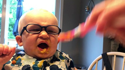 Baby tries chunky food for the first time and isn't convinced