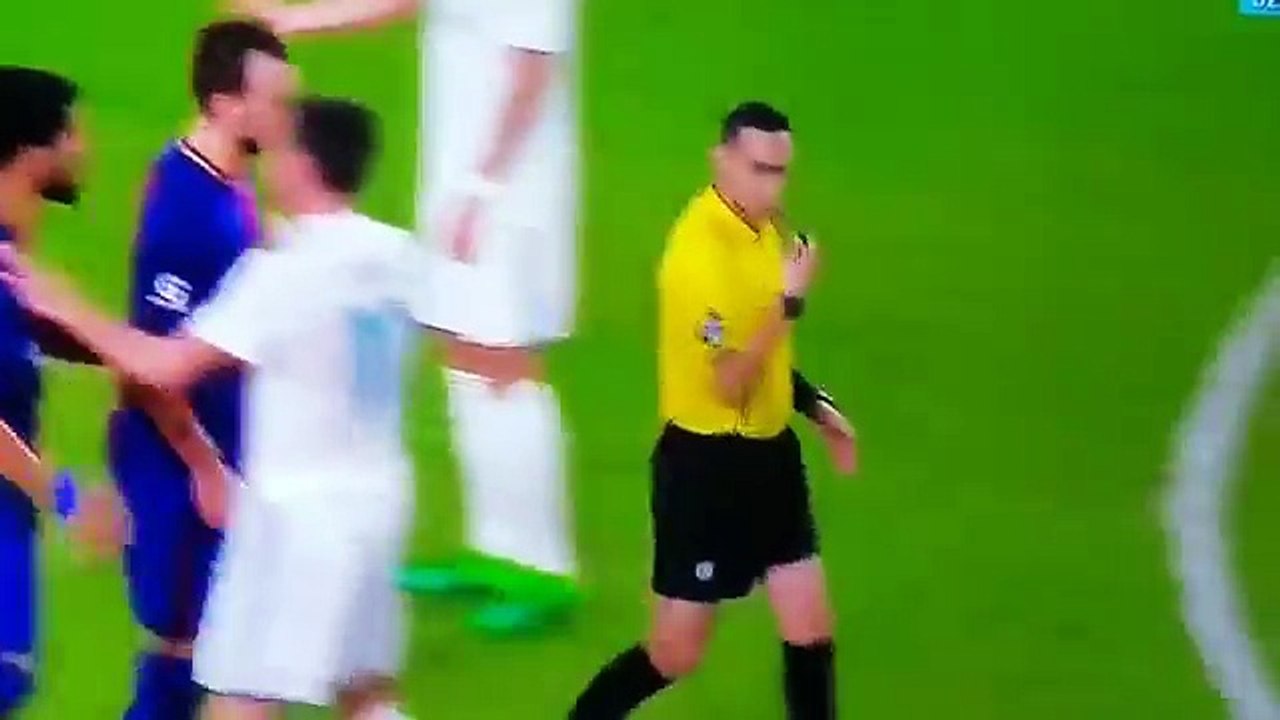 Ivan Rakitic and the referee Pushing each other and fighting