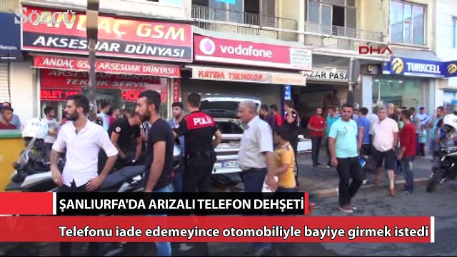 Arızalı telefonu iade edemeyince otomobiliyle bayiye girmek istedi