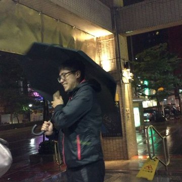 Civilians Take Refuge From Typhoon Nesat Winds Near Taipei MRT Entrance