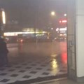 People Crowd in New Taipei City Metro Entrance As Typhoon Winds Rage Outside