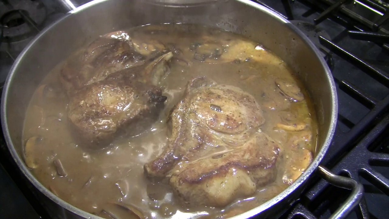 Bone-In Ribeye Pork Chops in a Mushroom Wine Sauce