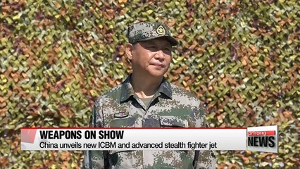 China shows off military might in anniversary parade