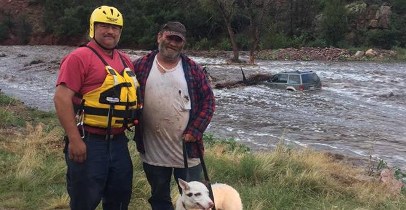 Man and Dog Rescued From Submerged Vehicle During Flash Flooding