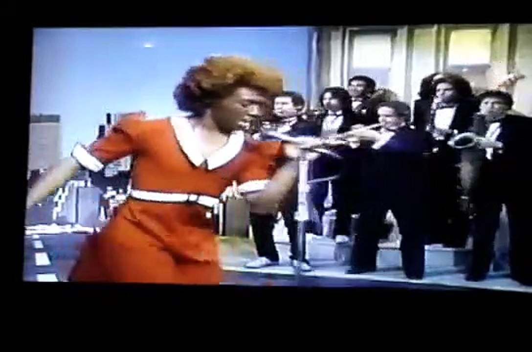 Eddie as James Brown playing Annie