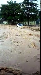 A Car And The Woman Driving It Drowned In Flood Water After  A Heavy Rainfall At Lagos