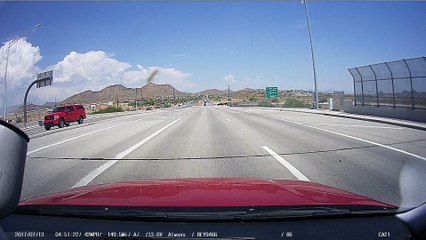 Truck Loses its Load of Pipes