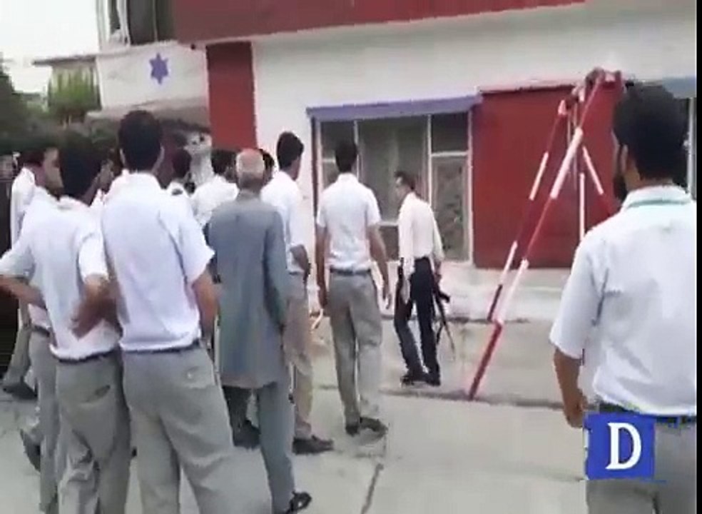 Admin official of Abbottabad college carries gun to dispel students protesting intermediate result
