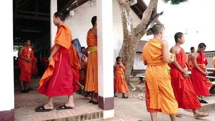 Laos youngsters seek ladder out of poverty through religion