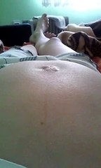 The baby kicking in stomach, funny and interesting