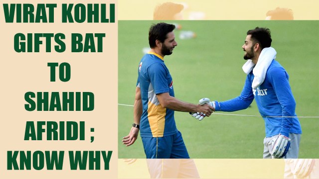 Virat Kohli donates signed bat to Shahid Afridi | Oneindia News