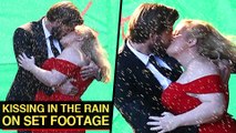 Liam Hemsworth Passionately KI$$ES Rebel Wilson Under Rain | 