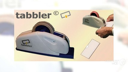 Mail tabbing machines