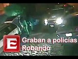 Graban a policías robando en Querétaro