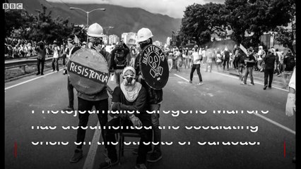 On the front line of Caracas protests - BBC News