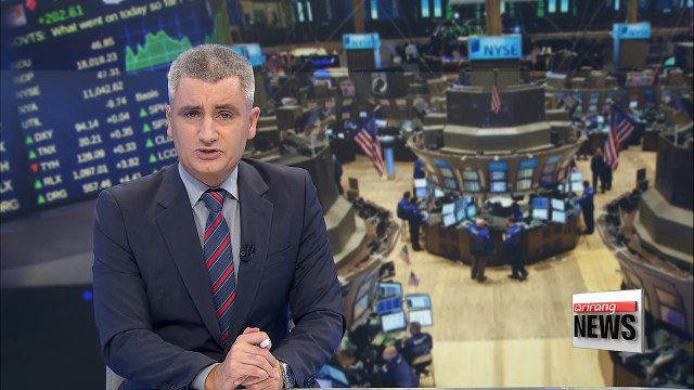 Dow Jones industrial average closes above 22,000 for first time