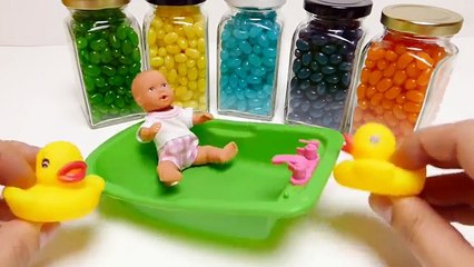 BABY DOLL BATH TIME! Learn Colors with Jelly Bean Baby Bottles with Surprise Toys Inside