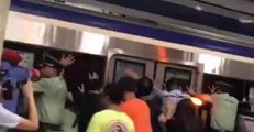 Beijing Crowds Push Train to Free Man Stuck in Platform Gap