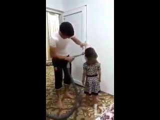Funny , Father tie baby hair with this way